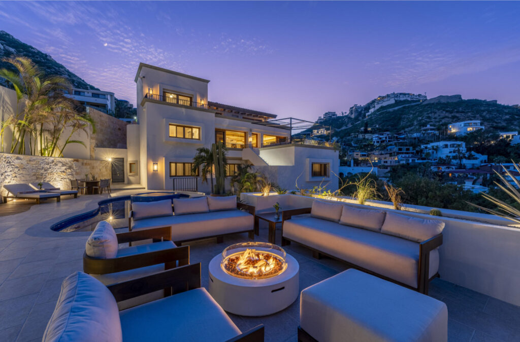 Los Cabos Luxury Pedregal Csl Casa LA PIÑATA A luxury villa located in the exclusive Pedregal Cabo San Lucas. Perfect as a private residence or a high-end vacation rental, this villa offers an exceptional combination of comfort, style, privacy, and location.The villa features 8 bedrooms including a service room (as an independent apartment suite), 8.5 bathrooms, and 13 beds.Fully furnished and equipped with top-quality finishes, providing a turnkey experience.Every detail has been thoughtfully crafted to create an exceptional space for family gatherings and entertaining. The expansive terrace includes a great swimming pool, 2 jacuzzi, bar, 2 BBQ station, 2 fire pits, and multiple lounge areas, to enjoy the very best of Cabo living The interiors feature cozy and elegant living spaces, including a inside bar, games room, media room and impeccable design in every corner Fully furnished and equipped, representing an outstanding opportunity. With its exceptional design, amenities, and location, this villa embodies the best of the Baja lifestyle – 125 Camino del Mar, Cabo San Lucas, BS
