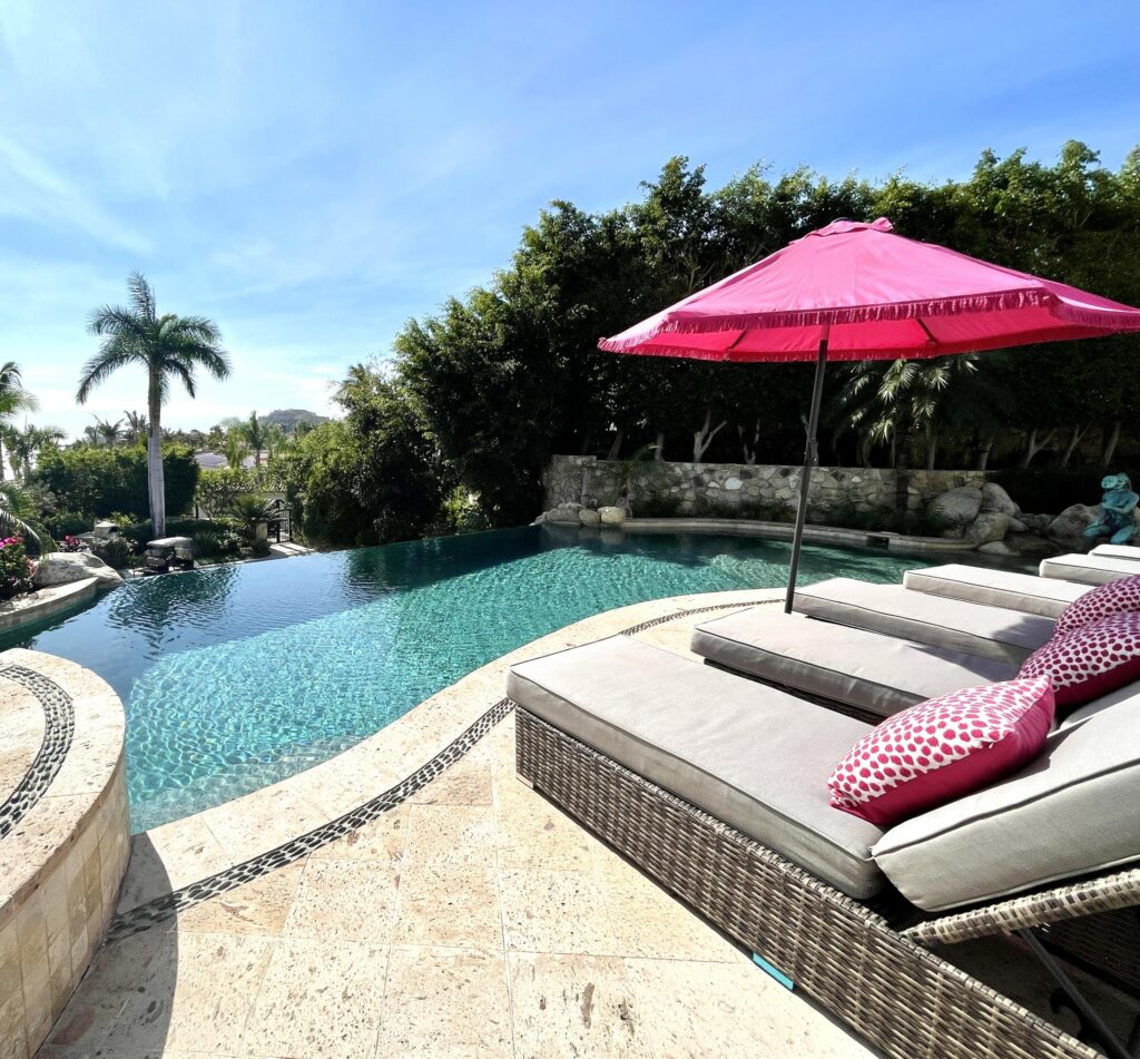Los Cabos Luxury Las Tunas The Nacuii Residence is a refined luxury home crafted to exceed the expectations of even the most discerning buyer. Nestled on a generous and private 3,000 m² lot (0.73 acres), it's just a short, effortless stroll to the untouched, sandy shores of Las Tunas — perfect for enjoying the serene coastal landscape and dramatic sunsets. The home offers a thoughtful layout with 3 spacious bedrooms, a separate studio, a cozy TV lounge, and 6 full bathrooms, including two principal suites, a guest room, a detached studio, and a dedicated media or family room. Expansive sliding glass doors invite natural light throughout the interiors while showcasing tranquil garden – 24 Caleta, San Jose Corridor, BS