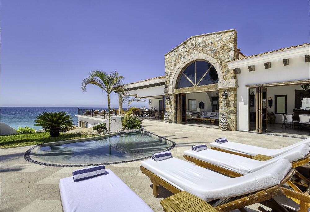 Los Cabos Luxury Section 4- Las Canadas Discover refined indoor-outdoor living at Cañada 9, set within Querencia, San Jose del Cabo's premier private golf community. Soaring beamed ceilings, walls of pocket glass, and luminous marble floors define an open great room that flows effortlessly to the terrace, infinity-edge pool, and stone-clad water feature -- all framed by panoramic Sea of Cortez and mountain for sale