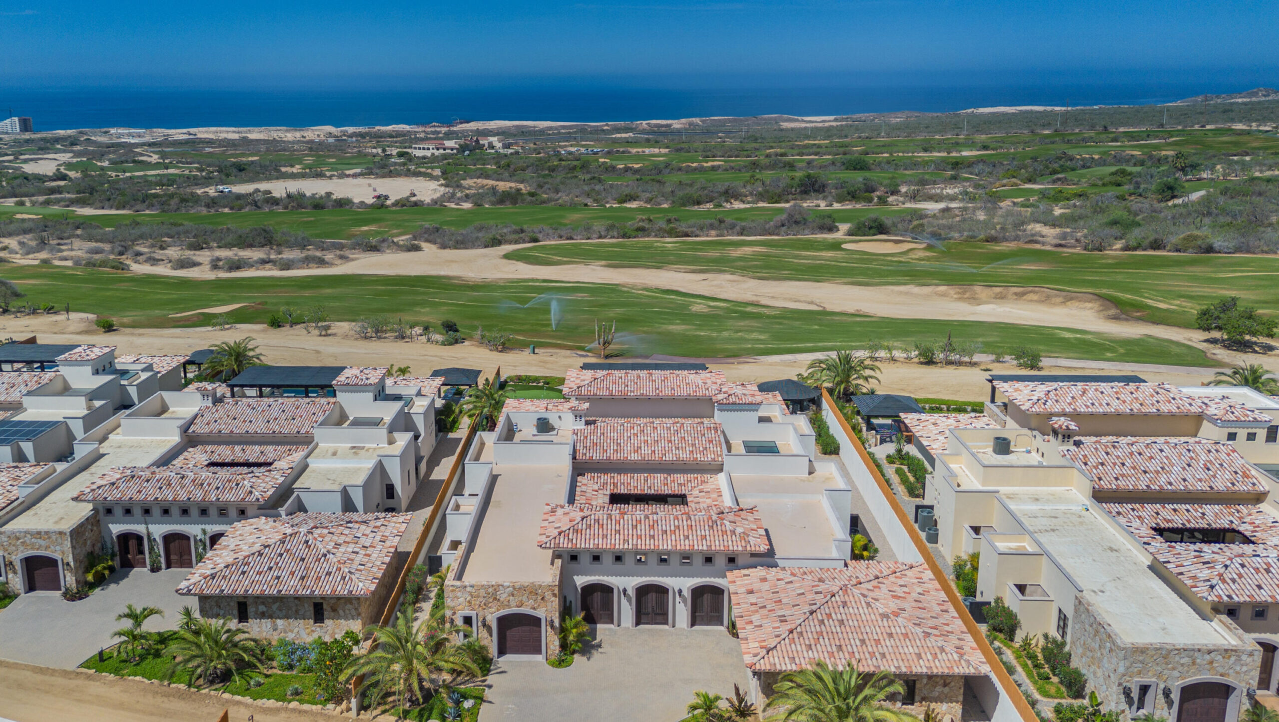 Los Cabos Luxury Las Tunas The Nacuii Residence is a refined luxury home crafted to exceed the expectations of even the most discerning buyer. Nestled on a generous and private 3,000 m² lot (0.73 acres), it's just a short, effortless stroll to the untouched, sandy shores of Las Tunas — perfect for enjoying the serene coastal landscape and dramatic sunsets. The home offers a thoughtful layout with 3 spacious bedrooms, a separate studio, a cozy TV lounge, and 6 full bathrooms, including two principal suites, a guest room, a detached studio, and a dedicated media or family room. Expansive sliding glass doors invite natural light throughout the interiors while showcasing tranquil garden for sale