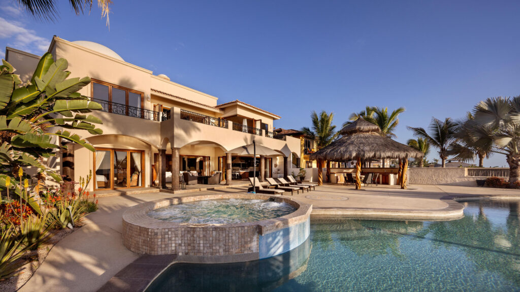 Los Cabos Luxury Park Hyatt Villa Mariposa is a stunning three-bedroom oceanfront retreat designed for those seeking privacy, tranquility, and timeless Baja elegance. Showcasing classic Hacienda-style architecture, the villa features rich wood furnishings, warm finishes, and tasteful pops of color that create an inviting and sophisticated atmosphere throughout.Wake up to the soothing sound of the waves and spend your days enjoying the private pool and hot tub overlooking the Sea of Cortez. The expansive terrace provides the perfect setting for al fresco dining, sunset cocktails, or simply relaxing while watching whales pass by during the season.The gourmet kitchen is equipped with high-end appliances and complemented by a charming breakfast nook. See more... The open-concept living and dining areas seamlessly connect to the spacious terrace, maximizing indoor-outdoor living and capturing breathtaking ocean – Hacienda Del Pacifico, Pacific, BS
