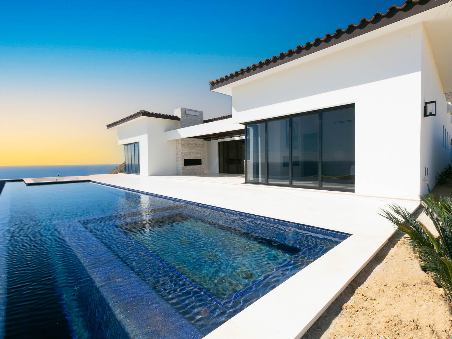 Los Cabos Luxury Copala Lot 40 is a stunning two-story residence featuring dual primary suites on the upper level, offering expansive Pacific Ocean for sale