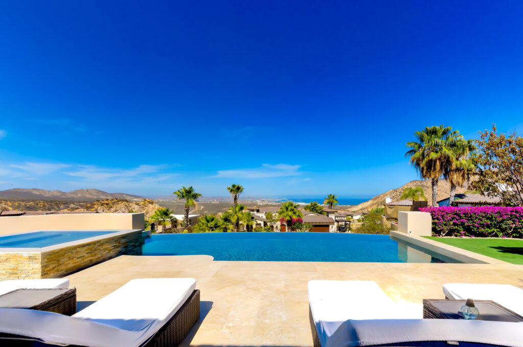 Los Cabos Luxury Section 4- Las Canadas Discover refined indoor-outdoor living at Cañada 9, set within Querencia, San Jose del Cabo's premier private golf community. Soaring beamed ceilings, walls of pocket glass, and luminous marble floors define an open great room that flows effortlessly to the terrace, infinity-edge pool, and stone-clad water feature -- all framed by panoramic Sea of Cortez and mountain – Querencia Golf and Ocean Club, San Jose Corridor, BS